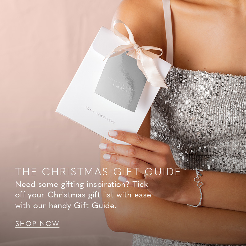 image of woman holding a personalised silver and white bow gift bag