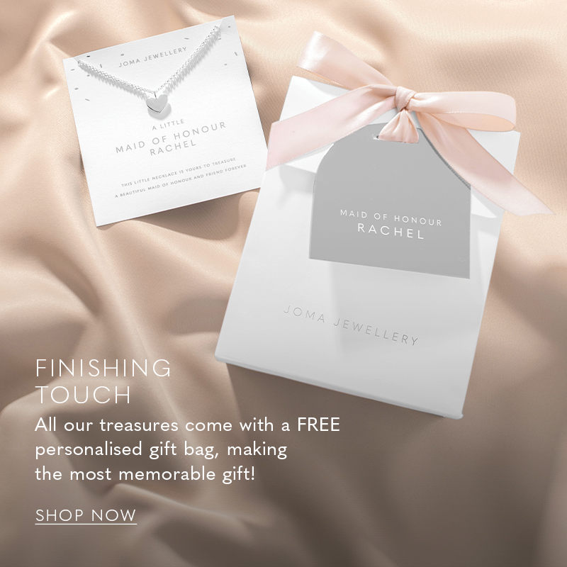 image of woman holding a personalised silver and white bow gift bag