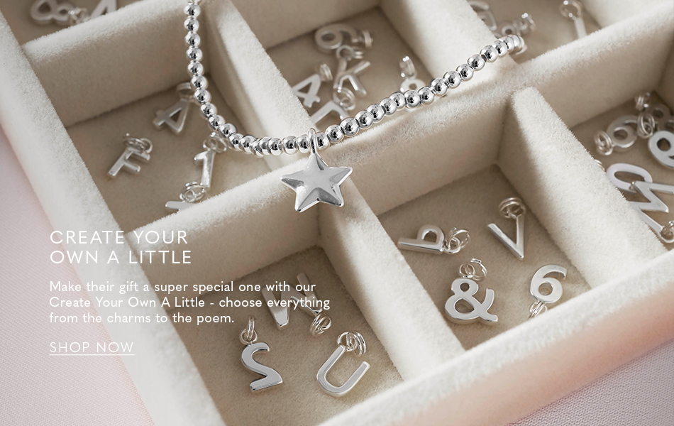 image of silver charm bracelet sitting on a jewellery box with individual silver charms available for personalisation